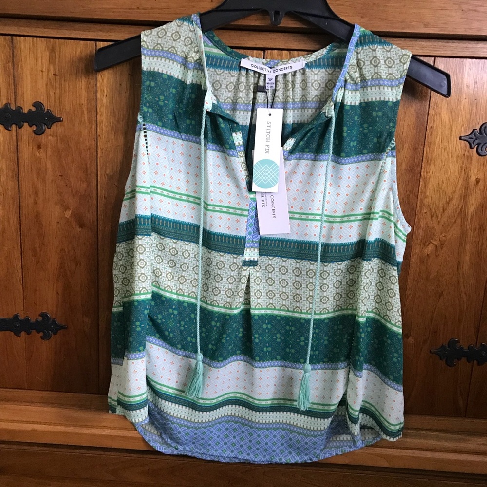 Green and blue sleeveless blouse